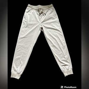 NWT Men’s Calvin Klein performance joggers. Off white size small